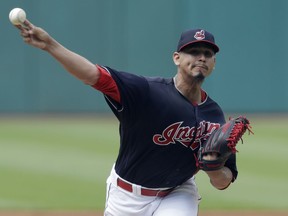 Cleveland Indians starting pitcher Carlos Carrasco delivers in the first inning of a baseball game against the Minnesota Twins, Saturday, June 16, 2018, in Cleveland.