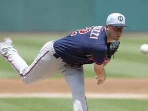 Minnesota Twins starting pitcher Jake Odorizzi delivers in the first inning of a baseball game against the Cleveland Indians, Sunday, June 17, 2018, in Cleveland.