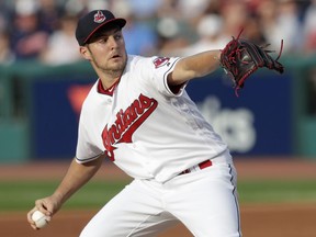 Cleveland Indians starting pitcher Trevor Bauer delivers in the first inning of a baseball game against the Chicago White Sox, Monday, June 18, 2018, in Cleveland.