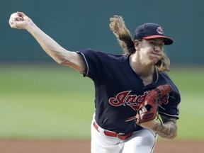 Cleveland Indians starting pitcher Mike Clevinger delivers in the first inning of a baseball game against the Chicago White Sox, Tuesday, June 19, 2018, in Cleveland.