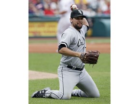 Chicago White Sox relief pitcher Luis Avilan throws out Cleveland Indians' Jason Kipnis at first base in the fifth inning of a baseball game, Wednesday, June 20, 2018, in Cleveland.