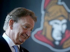 In this Sept. 7, 2017 file photo, Ottawa Senators owner Eugene Melnyk speaks to reporters at the Canadian Tire Centre.