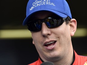 Kyle Busch answers questions in an interview during practice for Sunday's NASCAR Cup Series auto race, Saturday, June 2, 2018, in Long Pond, Pa.