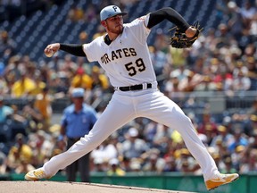 Pittsburgh Pirates starting pitcher Joe Musgrove delivers in the first inning of a baseball game against the Cincinnati Reds in Pittsburgh, Sunday, June 17, 2018.