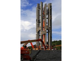 This May 31, 2018, photo shows the first section of the 93-foot tall Tower of Voices wind chimes is in place at the Flight 93 National Memorial in Shanksville, Pa. The final phase of the memorial is underway and on track to open on the 17th anniversary of plane's crash into a Pennsylvania field during 9/11.