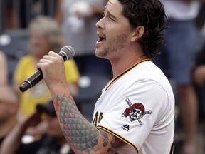 Pittsburgh Pirates relief pitcher Steven Brault sings the national anthem before the team's baseball game against the Milwaukee Brewers in Pittsburgh, Tuesday, June 19, 2018.