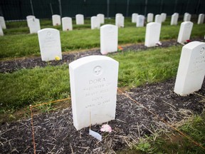 This photo taken June 13, 2018, shows the cemetery at the Carlisle Indian School in Carlisle, Pa. The U.S. Army Military Cemeteries group is disinterring four American Indian students who attended the Carlisle Indian School. They are among more than 180 children from 50 different tribes buried at the Carlisle Barracks.