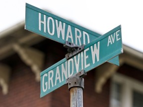 Street signs mark the intersection of Howard and Grandview Ave. on Wednesday, June 20, 2018, near where witnesses say a police officer fatally shot a 17-year-old boy just seconds after he fled from a traffic stop in a confrontation late Tuesday, in East Pittsburgh, Pa.