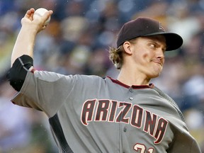 Arizona Diamondbacks starter Zack Greinke pitches against the Pittsburgh Pirates in the first inning of a baseball game, Saturday, June 23, 2018, in Pittsburgh.