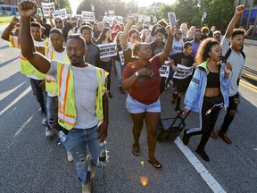 People start a protest march against the shooting death of Antwon Rose Jr. on Tuesday, June 26, 2018, in Pittsburgh. Rose was fatally shot by a police officer seconds after he fled a traffic stop June 19, in the suburb of East Pittsburgh.