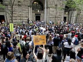 Protestors rally in front of the Allegheny County Courthouse on Thursday, June 21, 2018, in Pittsburgh. They are protesting the killing of Antwon Rose Jr. who was fatally shot by a police officer seconds after he fled a traffic stop  late Tuesday, in the suburb of East Pittsburgh.