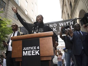 Rapper Meek Mill speaks outside the Philadelphia Criminal Justice in Center City, Pa., on Monday, June 18, 2018, as he attends a hearing to determine whether he should get a new trial in his decade-old gun and drug convictions.