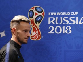 Croatia's Ivan Rakitic arrives for a press conference on the eve of the group D match between Croatia and Argentina in the Nizhny Novgorod stadium in Nizhny Novgorod, Russia, Wednesday, June 20, 2018.