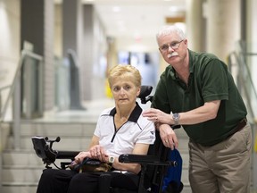 Tim Nolan, who is legally blind, and his wife, Kim Nolan, who requires the use of a wheelchair, are photographed together in Hamilton, on Wednesday, June 6, 2018.