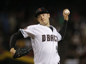 Arizona Diamondbacks starting pitcher Patrick Corbin throws to a San Francisco Giants batter during the first inning of a baseball game Friday, June 29, 2018, in Phoenix.