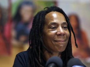 Debbie Africa becomes emotional during a news conference Tuesday, June 19, 2018, in Philadelphia. Africa, a member of the radical group MOVE, was released from prison on Saturday, nearly 40 years after the group engaged in a shootout that killed a Philadelphia police officer in 1978. She is the first of the so-called "MOVE 9" to be released on parole.