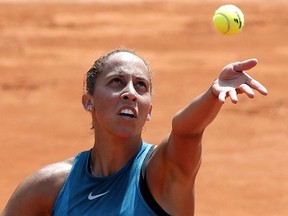 Madison Keys of the U.S.serves to Romania's Mihaela Buzarnescu during their fourth round match of the French Open tennis tournament at the Roland Garros stadium, Sunday, June 3, 2018 in Paris.