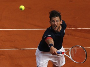 Austria's Dominic Thiem is to return the ball to Spain's Rafael Nadal during the men's final match of the French Open tennis tournament at the Roland Garros stadium, Sunday, June 10, 2018 in Paris.
