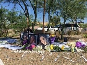 Yue Jiang is shown in large photographs at a memorial over two years after her death in Tempe, Ariz. on Monday, June 11, 2018.  The family of 19-year-old Yeu Jiang traveled from China to Arizona this week to plead with a judge to reject a deal that prosecutors made with suspect Holly Davis that reduces her charges.