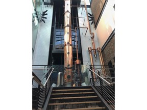 This Thursday, June 7, 2018, photo, shows the copper column still at Old Forester Distilling Co. in downtown Louisville, Ky. Old Forester, the bourbon that launched a family dynasty and a spirits company, has returned to its pre-Prohibition Kentucky home in a newly renovated building that symbolizes the brand's comeback.