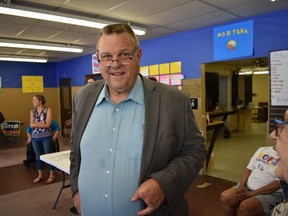 In this Friday, June 8, 2018 photo, U.S. Sen. Jon Tester speaks with a supporter during an event at the Tester campaign headquarters in Billings, Mont. Republicans are hoping to unseat the two-term incumbent in November.