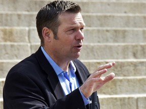 FILE - In this April 20, 2018, file photo, Kansas Secretary of State Kris Kobach speaks during a rally in Topeka, Kan. The American Civil Liberties Union of Kansas filed a federal lawsuit Tuesday, June 19, 2018, against Kobach challenging a multi-state voter registration database it claims exposed sensitive information including partial Social Security numbers from nearly a thousand state voters.