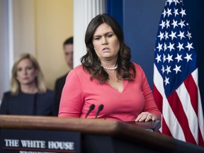 White House Press Secretary Sarah Huckabee Sanders arrives to speak during a news briefing at the White House.