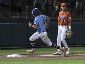 Morehead State's Trevor Snyder (3) rounds third near Clemson's Patrick Cromwell (25) during the second inning in an NCAA college baseball tournament regional game in Clemson, S.C., Friday June 1, 2018.
