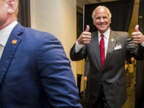 Following his victory in the primary runoff election, South Carolina Gov. Henry McMaster leaves his suite at Spirit Communications Park and heads to the podium speak at his victory party, Tuesday, June 26, 2018, in Columbia, S.C.