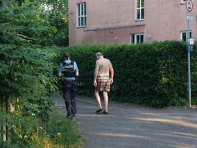 Alexander Gauland had to walk to a police station in his swimming shorts after his clothes were stolen.