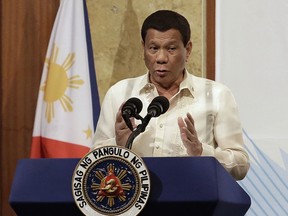 FILE - In this Tuesday, June 5, 2018, file photo, Philippine President Rodrigo Duterte speaks during a South Korea-Philippines business forum and luncheon in Seoul, South Korea. Upon his return to the Philippines, Duterte has again threatened to resort to emergency power and use it "to the hilt" to deal with relentless criticisms over his human rights record, crimes and government wrongdoing despite his extra-tough approach to law and order.
