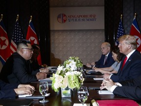 President Donald Trump meets with North Korean leader Kim Jong Un on Sentosa Island, Tuesday, June 12, 2018, in Singapore.