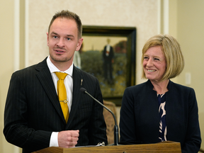 A swearing-in ceremony was held at Government House in Edmonton on Monday June 18, 2018 after Alberta Premier Rachel Notley (right) announced a cabinet shuffle.