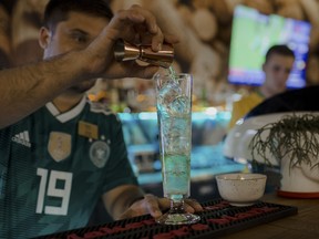 The Meldonium, an absinthe-based cocktail named after a performance-enhancing drug, is prepared at La Punto restaurant in Sochi, Russia on June 19.