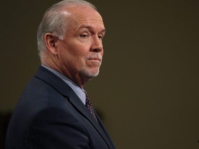 Premier John Horgan attends a press conference in the press theatre at Legislature in Victoria, B.C., on Tuesday May 29, 2018.