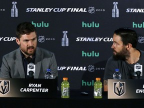 Vegas Golden Knights forward Ryan Carpenter, left, speaks to the media as defenceman Deryk Engelland listens on June 3.