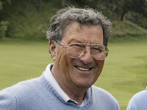 FILE - In this Nov. 24, 2004, file photo Australian golfer Peter Thomson poses for a photo after an exhibition match at the Australian Golf Club in Sydney. Golf Australia says on Wednesday, June 20, 2018, the family of five-time British Open champion Peter Thomson has announced his death. He was 88.