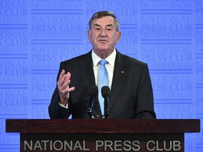 Huawei Technologies Australia Chairman John Lord speaks at the National Press Club in Canberra, Wednesday, June 27, 2018. Lord says Australia could damage its economic future if it bans the Chinese telecommunication giant from the nation's next-generation mobile network technology.