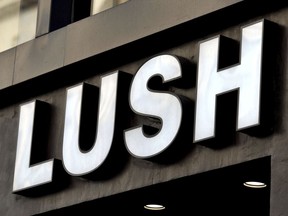 FILE - A June 1, 2016 file photo of a shop sign for LUSH. Cosmetics retailer Lush has been criticized for using store window displays to criticize undercover police operations. On Friday June 1, 2018 the windows of more than 100 Lush stores in Britain featured displays supporting the Police Spies Out of Lives campaign.