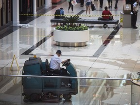 Crews clean up after a leak broke out at Eaton Centre in Toronto on Wednesday, June 13, 2018. Even the iconic Eaton Centre mall wasn't a refuge from the rain as a storm rolled through downtown Toronto on Wednesday afternoon.