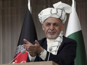 FILE - In this Feb. 23, 201, file photo, Afghanistan's President Ashraf Ghani speaks during the integration ceremony of TAPI pipeline in Herat city, west of Kabul, Afghanistan. The Afghan Taliban have announced a three-day cease-fire over the Eid al-Fitr holiday at the end of the holy month of Ramadan, a first for the group, following an earlier cease-fire announcement by the government. Ghani on Thursday, June 7, 2018 announced a weeklong cease-fire with the Taliban to coincide with the holiday.