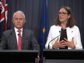 European Trade Commissioner Cecilia Malmstrom, right, speaks as Australian Prime Minister Malcolm Turnbull listens during a press conference at Parliament House in Canberra, Australia, Monday, June 18, 2018. Trade liberalization continues to have global momentum despite recent U.S. tariffs on steel and aluminum imports, Malmstrom said as she launched free trade negotiations between the European Union and Australia.