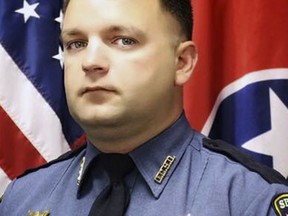 This photo provided by the Dickson County Sheriff's Office shows Sgt. Daniel Baker. A manhunt continued Thursday, May 31, 2018 in the slaying of a Baker, a Tennessee sheriff's deputy who was fatally shot during a traffic stop. (Dickson County Sheriff's Office via AP)
