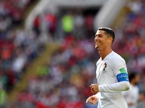 Portugal forward Cristiano Ronaldo smiles during a World Cup match against Morocco on June 20.