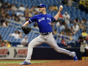Toronto Blue Jays starter J.A. Happ pitches against the Tampa Bay Rays on June 13.