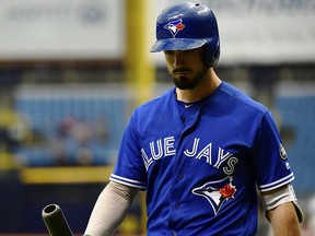 Toronto Blue Jays outfielder Randal Grichuk walks off the field after striking out in the ninth inning against the Tampa Bay Rays on June 13.