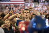 Supporters of President Donald Trump taunt the media after being egged on by the president during a on June 20, 2018 in Duluth Minnesota.