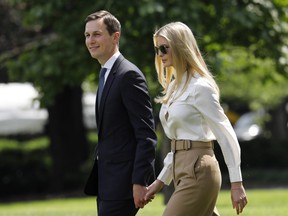 Jared Kushner, senior White House adviser, left, and Ivanka Trump, assistant to U.S. President Donald Trump, walk on the South Lawn of the White House to board Marine One before departing to Camp David in Washington, D.C., U.S., on Friday, June 1, 2018.