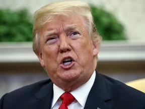 In this May 17, 2018 photo, President Donald Trump speaks in the Oval Office of the White House in Washington.