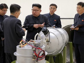 This undated file image distributed Sept. 3, 2017, by the North Korean government, shows North Korean leader Kim Jong Un at an undisclosed location.